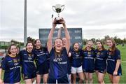 24 October 2018; Aoife Toner, captain of DCU 3, lifts the cup as her team-mates celebrate after the Junior Final during the 2018 Gourmet Food Parlour HEC Freshers Blitz at Dublin City University in Dublin. Photo by Matt Browne/Sportsfile