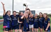 24 October 2018; Aoife Toner, captain of DCU 3, lifts the cup as her team-mates celebrate after the Junior Final during the 2018 Gourmet Food Parlour HEC Freshers Blitz at Dublin City University in Dublin. Photo by Matt Browne/Sportsfile