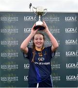 24 October 2018; Aoife Toner, captain of DCU 3, lifts the cup after the Junior Final during the 2018 Gourmet Food Parlour HEC Freshers Blitz at Dublin City University in Dublin. Photo by Matt Browne/Sportsfile