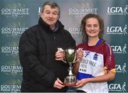 24 October 2018; Con Moynihan presents Roisin Ambrose captain of UL with the cup after the Senior final between Mary Immaculate College Limerick and University of Limerick at the 2018 Gourmet Food Parlour HEC Freshers Blitz at Dublin City University in Dublin. Photo by Matt Browne/Sportsfile