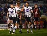 26 October 2018; Daniel Cleary, 21, is congratulated by his Dundalk team-mates Ronan Murray and Brian Gartland, right, after scoring his side's first goal during the SSE Airtricity League Premier Division match between Bohemians and Dundalk at Dalymount Park in Dublin. Photo by Stephen McCarthy/Sportsfile