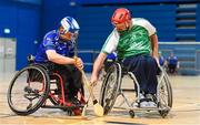 27 October 2018;Maurice Noonan of Munster in action against Lorcan Madden of Leinster during the M.Donnelly GAA Wheelchair Hurling All-Ireland Finals match between Munster and Leinster at the Sport Ireland National Indoor Arena in Abbotstown, Dublin. Photo by Barry Cregg/Sportsfile