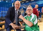 27 October 2018; Uachtarán Cumann Lúthchleas Gael John Horan presents Leinster captain Sean Bennett with the Inter Provincial tournament trophy following the M.Donnelly GAA Wheelchair Hurling All-Ireland Finals match between Munster and Leinster at the Sport Ireland National Indoor Arena in Abbotstown, Dublin. Photo by Barry Cregg/Sportsfile