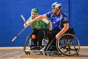 27 October 2018; John Scott of Leinster in action against James McCarthy of Munster during the M.Donnelly GAA Wheelchair Hurling All-Ireland Finals match between Munster and Leinster at the Sport Ireland National Indoor Arena in Abbotstown, Dublin. Photo by Barry Cregg/Sportsfile