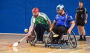27 October 2018; Lorcan Madden of Leinster in action against James McCarthy of Munster during the M.Donnelly GAA Wheelchair Hurling All-Ireland Finals match between Munster and Leinster at the Sport Ireland National Indoor Arena in Abbotstown, Dublin. Photo by Barry Cregg/Sportsfile