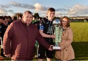 27 October 2018; Daragh Ellison of Finn Harps receives the trophy from Eamon Naughton, Chairman of the Airtricity League of Ireland, and Sinead McGavigan of SSE Airtricity after the SSE Airtricity U17 League Final match between Finn Harps and Shamrock Rovers at Maginn Park in Buncrana, Donegal. Photo by Oliver McVeigh/Sportsfile