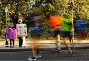28 October 2018; Liadh, age 5, left, and Naoise Fitzmaurice, age 9, from Wexford, watch on during the 2018 SSE Airtricity Dublin Marathon. 20,000 runners took to the Fitzwilliam Square start line to participate in the 39th running of the SSE Airtricity Dublin Marathon, making it the fifth largest marathon in Europe. Photo by Eóin Noonan/Sportsfile
