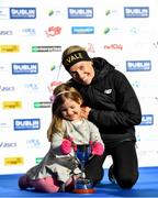 28 October 2018; National Women’s Champion, Lizzie Lee of Leevale AC, Co. Cork, and her daughter Lucy, age 4, celebrate following the 2018 SSE Airtricity Dublin Marathon. 20,000 runners took to the Fitzwilliam Square start line to participate in the 39th running of the SSE Airtricity Dublin Marathon, making it the fifth largest marathon in Europe. Photo by Ramsey Cardy/Sportsfile