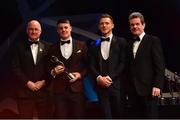 2 November 2018; Dublin footballer Brian Howard is presented with his PwC All Star award by, from left, Uachtarán Chumann Lúthchleas Gael John Horan, GPA CEO Paul Flynn, and CEO of PwC Ireland Feargal O'Rourke during the PwC All Stars 2018 at the Convention Centre in Dublin. Photo by Ramsey Cardy/Sportsfile