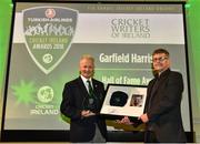 2 November 2018; Garfield Harrison, left, is presented with the Cricket Writers of Ireland Hall of Fame Award by journalist Ian Callender during the Turkish Airlines 2018 Cricket Ireland Awards at the Royal College of Physicians in Dublin. Photo by Seb Daly/Sportsfile
