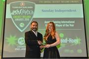 2 November 2018; Una Raymond-Hoey is presented with the Sunday Independent Aengus Fanning International Emerging Player of the Year award by John Greene, Sports Editor of the Sunday Independent, during the Turkish Airlines 2018 Cricket Ireland Awards at the Royal College of Physicians in Dublin. Photo by Seb Daly/Sportsfile