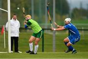 3 November 2018; Thomas Dowling of Ireland in action against Roddy Young of Scotland during the U21 Hurling Shinty International 2018 match between Ireland and Scotland at Games Development Centre in Abbotstown, Dublin. Photo by Piaras Ó Mídheach/Sportsfile