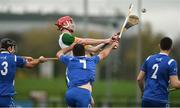 3 November 2018; James Burke of Ireland in action against Scotland players, from left, Rory MacKeachan, Blair Morrison, and Lachlan Smith during the U21 Hurling Shinty International 2018 match between Ireland and Scotland at Games Development Centre in Abbotstown, Dublin. Photo by Piaras Ó Mídheach/Sportsfile