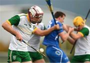 3 November 2018; Jack Fitzpatrick of Ireland races out of defence as Innes Blackhall of Scotland and Damien Reck of Ireland tussle off the ball during the U21 Hurling Shinty International 2018 match between Ireland and Scotland at Games Development Centre in Abbotstown, Dublin. Photo by Piaras Ó Mídheach/Sportsfile