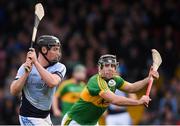 4 November 2018; Peter Casey of Na Piarsaigh scores his side's second goal under pressure from Joey O'Keeffe of Clonoulty / Rossmore during the AIB Munster GAA Hurling Senior Club Championship semi-final match between Na Piarsaigh and Clonoulty / Rossmore at the Gaelic Grounds in Limerick. Photo by Piaras Ó Mídheach/Sportsfile