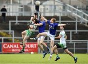 4 November 2018; Declan Rooney of Burren in action against Frank Caulfield, left, and Kieran Hughes of Scotstown during the AIB Ulster GAA Football Senior Club Championship quarter-final match between Burren and Scotstown at Páirc Esler in Newry, Down. Photo by Oliver McVeigh/Sportsfile