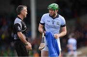 4 November 2018; Shane Dowling of Na Piarsaigh dries the sliotar, before taking a free, while in conversation with referee Diarmuid Kirwan during the AIB Munster GAA Hurling Senior Club Championship semi-final match between Na Piarsaigh and Clonoulty / Rossmore at the Gaelic Grounds in Limerick. Photo by Piaras Ó Mídheach/Sportsfile