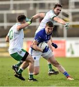 4 November 2018; Darren Hughes of Scotstown in action against Cathal Foy, left, and Declan Rooney of Burren during the AIB Ulster GAA Football Senior Club Championship quarter-final match between Burren and Scotstown at Páirc Esler in Newry, Down. Photo by Oliver McVeigh/Sportsfile