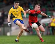 4 November 2018; Jamie Barron of The Nire in action against Stephen Keeley of Adare during the AIB Munster GAA Football Senior Club Championship quarter-final match between Adare and The Nire at the Gaelic Grounds in Limerick. Photo by Piaras Ó Mídheach/Sportsfile