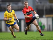 4 November 2018; Mikey Lyons of Adare in action against Jamie Barron of The Nire during the AIB Munster GAA Football Senior Club Championship quarter-final match between Adare and The Nire at the Gaelic Grounds in Limerick. Photo by Piaras Ó Mídheach/Sportsfile
