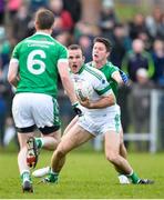 4 November 2018; Tomas McCann of Cargan Erin's Own in action against Niall MacAoidh of Gaoth Dobhair during the AIB Ulster GAA Football Senior Club Championship quarter-final match between Cargan Erin's Own and Gaoth Dobhair at Corrigan Park in Antrim. Photo by Mark Marlow/Sportsfile