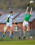 4 November 2018; John Carron of Cargan Erin's Own in action against Michael O'Cearbhaill of Gaoth Dobhair during the AIB Ulster GAA Football Senior Club Championship quarter-final match between Cargan Erin's Own and Gaoth Dobhair at Corrigan Park in Antrim. Picture Mark Marlow/Sportsfile