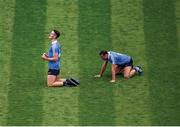 The final whistle inspires varying emotions. Brian Fenton drops to his knees and clenches his fists; Cormac Costello looks shattered after emptying the tank in a second-half cameo.    This image may be reproduced free of charge when used in conjunction with a review of the book &quot;A Season of Sundays 2018&quot;. All other usage © SPORTSFILE