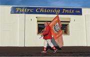Flying the flag. Cork supporter Joe Cole from Charleville arrives in Cusack Park, Ennis bedecked in the Rebels’ gear.    This image may be reproduced free of charge when used in conjunction with a review of the book &quot;A Season of Sundays 2018&quot;. All other usage © SPORTSFILE