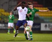 8 November 2018; Conor Carty of Republic of Ireland in action against Dynel Simeu of England during the U17 International Friendly match between Republic of Ireland and England at Tallaght Stadium in Tallaght, Dublin. Photo by Brendan Moran/Sportsfile