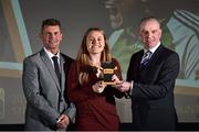 9 November 2018; Republic of Ireland manager Colin Bell, left, and Tom Dennigan from Continental Tyres present Amber Barrett from Peamount United with her Team of the year trophy during the Continental Tyres Women’s National League Awards at Ballsbridge Hotel, in Dublin. Photo by Matt Browne/Sportsfile