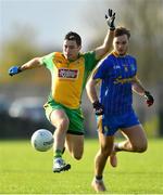 11 November 2018; Dylan Wall of Corofin in action against Ultan Harney of Clann na nGael during the AIB Connacht GAA Football Senior Club Championship semi-final match between Clann na nGael and Corofin at Dr. Hyde Park in Roscommon. Photo by Ramsey Cardy/Sportsfile
