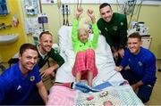 13 November 2018; Freya Fitzpatrick, age 13, from Dublin, with players, from left, Jonny Evans of Northern Ireland, David Meyler of Republic of Ireland, Shane Duffy of Republic of Ireland and Steven Davis of Northern Ireland during a visit to Our Lady's  Children's Hospital at St John's Ward Our Lady's Children's Hospital in Crumlin, Dublin. Photo by David Fitzgerald/Sportsfile