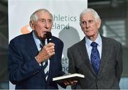 14 November 2018; Dr Ronnie Delany, left, 1956 Olympic 1,500m Champion, speaking during the launch of author Peter Byrne's new book, ‘Winning for Ireland - How Irish Athletes Conquered The World’, at the National Indoor Arena in Abbotstown, Dublin. Photo by Seb Daly/Sportsfile