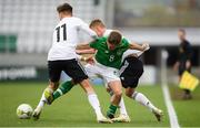 14 November 2018; Séamas Keogh of Republic of Ireland is tackled by Tim Lemperle, left, and Jannis Lang of Germany during the U17 International Friendly match between Republic of Ireland and Germany at Tallaght Stadium in Tallaght, Dublin. Photo by Eóin Noonan/Sportsfile