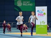 14 November 2018; Students from St Brigid's National School, Castleknock, complete their Daily Mile prior to the launch of ‘Winning for Ireland - How Irish Athletes Conquered The World’, at the National Indoor Arena in Abbotstown, Dublin. Photo by Seb Daly/Sportsfile