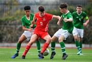 14 November 2018; Ryan Viggers of Wales in action against CJ Egan-Reilly, left, and Kailin Barlow of Republic of Ireland during the U16 Victory Shield match between Republic of Ireland and Wales at Mounthawk Park in Tralee, Kerry. Photo by Brendan Moran/Sportsfile