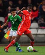 14 November 2018; Siyabonga Ligedenza of Wales in action against CJ Egan-Reilly of Republic of Ireland during the U16 Victory Shield match between Republic of Ireland and Wales at Mounthawk Park in Tralee, Kerry. Photo by Brendan Moran/Sportsfile