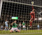 15 November 2018; Bailey Peacock-Farrell of Northern Ireland makes a save following a header from Shane Duffy of Republic of Ireland during the International Friendly match between Republic of Ireland and Northern Ireland at the Aviva Stadium in Dublin. Photo by Seb Daly/Sportsfile