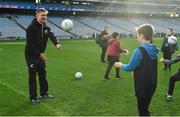 16 November 2018; World Rugby Champions, New Zealand All Blacks and Dublin GAA senior players were in Croke Park today at the AIG Heroes event, a CSR initiative to help support local grassroots communities by using their sporting partnerships with Dublin GAA and others to promote sport as a means to build self-confidence and social skills in young kids. As part of the visit to Croke Park, AIG also gifted primary schools in the area with sports equipment. AIG is proud sponsor of Dublin GAA and New Zealand Rugby. Pictured is Jack Goodhue of New Zealand All Blacks with Jake Durning, aged 10, from St Columbas NS, during the AIG Heroes Event at Croke Park, Dublin. Photo by Sam Barnes/Sportsfile