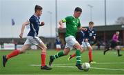 16 November 2018; Gavin O'Brien of Republic of Ireland in action against Lyall Booth of Scotland during the U16 Victory Shield match between Republic of Ireland and Scotland at Mounthawk Park in Tralee, Kerry. Photo by Brendan Moran/Sportsfile