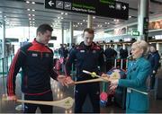 16 November 2018; Cork and Clare hurlers departed Dublin Airport for Boston today onboard an Aer Lingus flight. Aer Lingus, Title Sponsor and Official Airline of the Aer Lingus Fenway Hurling Classic, is thrilled to once again be supporting this unique cultural and sporting event, bringing four teams and 130 hurlers to Boston’s famous Fenway Park. Games will be broadcast on TG4 on Sunday, November 18th with Wexford v Limerick in the first semi-final and Clare v Cork in the second semi-final. Pictured at the Aer Lingus Fenway Hurling Classic - Send Off is Cork hurlers, Séamus Harnedy and Damien Cahalane with Aer Lingus staff member Jordyn Boyle at Dublin Airport, Dublin. Photo by Eóin Noonan/Sportsfile