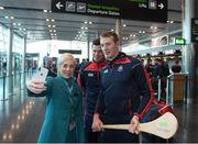 16 November 2018; Cork and Clare hurlers departed Dublin Airport for Boston today onboard an Aer Lingus flight. Aer Lingus, Title Sponsor and Official Airline of the Aer Lingus Fenway Hurling Classic, is thrilled to once again be supporting this unique cultural and sporting event, bringing four teams and 130 hurlers to Boston’s famous Fenway Park. Games will be broadcast on TG4 on Sunday, November 18th with Wexford v Limerick in the first semi-final and Clare v Cork in the second semi-final. Pictured at the Aer Lingus Fenway Hurling Classic - Send Off is Cork hurlers, Séamus Harnedy and Damien Cahalane with Aer Lingus staff member Jordyn Boyle at Dublin Airport, Dublin. Photo by Eóin Noonan/Sportsfile