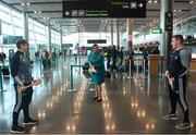 16 November 2018; Cork and Clare hurlers departed Dublin Airport for Boston today onboard an Aer Lingus flight. Aer Lingus, Title Sponsor and Official Airline of the Aer Lingus Fenway Hurling Classic, is thrilled to once again be supporting this unique cultural and sporting event, bringing four teams and 130 hurlers to Boston’s famous Fenway Park. Games will be broadcast on TG4 on Sunday, November 18th with Wexford v Limerick in the first semi-final and Clare v Cork in the second semi-final. Pictured at the Aer Lingus Fenway Hurling Classic - Send Off is Clare hurlers Michael O'Neill and Colm Galvin with Aer Lingus staff member Meghan Byrne at Dublin Airport, Dublin. Photo by Eóin Noonan/Sportsfile