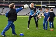 16 November 2018; World Rugby Champions, New Zealand All Blacks and Dublin GAA senior players were in Croke Park today at the AIG Heroes event, a CSR initiative to help support local grassroots communities by using their sporting partnerships with Dublin GAA and others to promote sport as a means to build self-confidence and social skills in young kids. As part of the visit to Croke Park, AIG also gifted primary schools in the area with sports equipment. AIG is proud sponsor of Dublin GAA and New Zealand Rugby. Pictured is Nicole Owens of Dublin, with Tom Crystal, left, and Michael Quinn, during the AIG Heroes Event at Croke Park, Dublin. Photo by Sam Barnes/Sportsfile