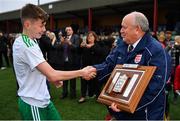 16 November 2018; Owen Aiston, Chairman of SAFIB, presents the Victory Shield to Northern Ireland captain Conor Bradley after the U16 Victory Shield match between Northern Ireland and Wales at Mounthawk Park in Tralee, Kerry. Photo by Brendan Moran/Sportsfile
