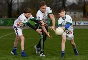 17 November 2018; Dublin All-Ireland winner and All-Star Paul Mannion puts the Ballyboden under 13 boys’ football team through their paces. The team were selected as winners of the John West competition as part of their sponsorship of the Feile. John West has sponsored the Feile since 2016 and throughout the sponsorship, John West has focused on encouraging children to participate in Gaelic Games while emphasising the importance natural protein plays in fuelling a young athlete. Pictured is Paul Mannion with Luke Fitzpatrick, age 13, from Knocklyon, left, and Ryan Culleton age 13, from Rathfarnham, during the John West Training Session with Paul Mannion at Ballyboden St Endas GAA in Ballyboden, Dublin. Photo by Eóin Noonan/Sportsfile