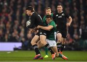 17 November 2018; Beauden Barrett of New Zealand is tackled by Jacob Stockdale of Ireland during the Guinness Series International match between Ireland and New Zealand at the Aviva Stadium in Dublin. Photo by Brendan Moran/Sportsfile