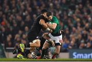 17 November 2018; Jonathan Sexton of Ireland is tackled by Ardie Savea and Liam Squire of New Zealand during the Guinness Series International match between Ireland and New Zealand at the Aviva Stadium in Dublin. Photo by Brendan Moran/Sportsfile