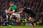 17 November 2018; Garry Ringrose of Ireland is tackled by Ryan Crotty of New Zealand during the Guinness Series International match between Ireland and New Zealand at the Aviva Stadium in Dublin. Photo by Ramsey Cardy/Sportsfile