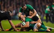 17 November 2018; Jacob Stockdale of Ireland, supported by team-mate Peter O’Mahony is tackled by Ben Smith of New Zealand during the Guinness Series International match between Ireland and New Zealand at Aviva Stadium, Dublin. Photo by Brendan Moran/Sportsfile